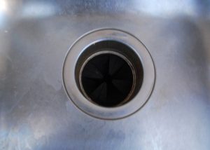 How to Unclog Kitchen Sink with Standing Water Using Disposal