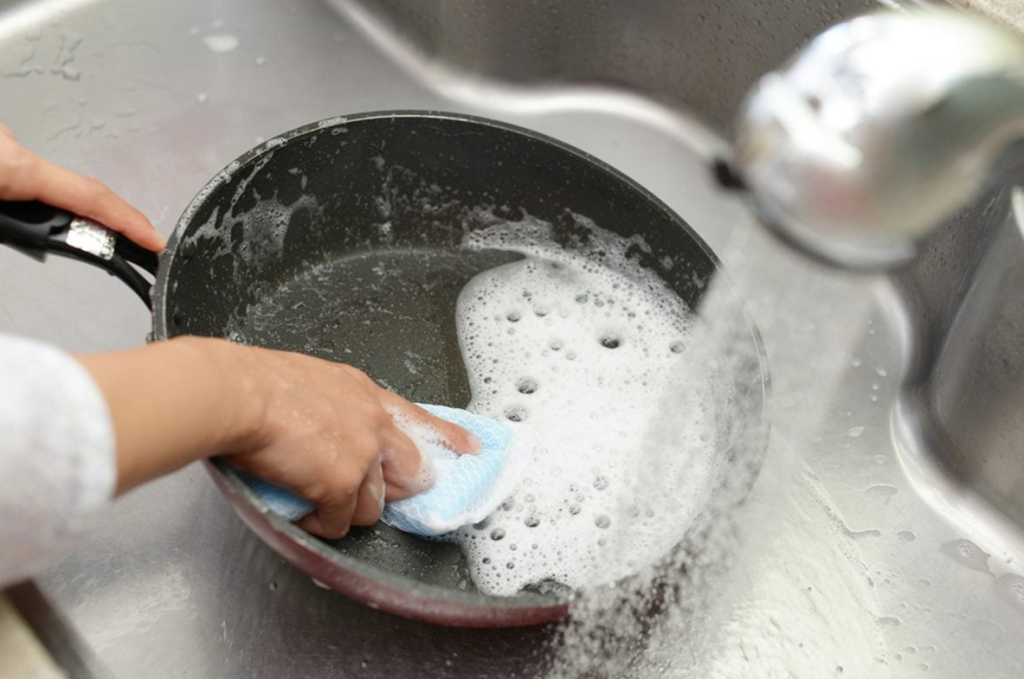 clean ceramic pan with soap and water